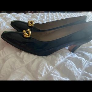 Patent leather with gold buckle